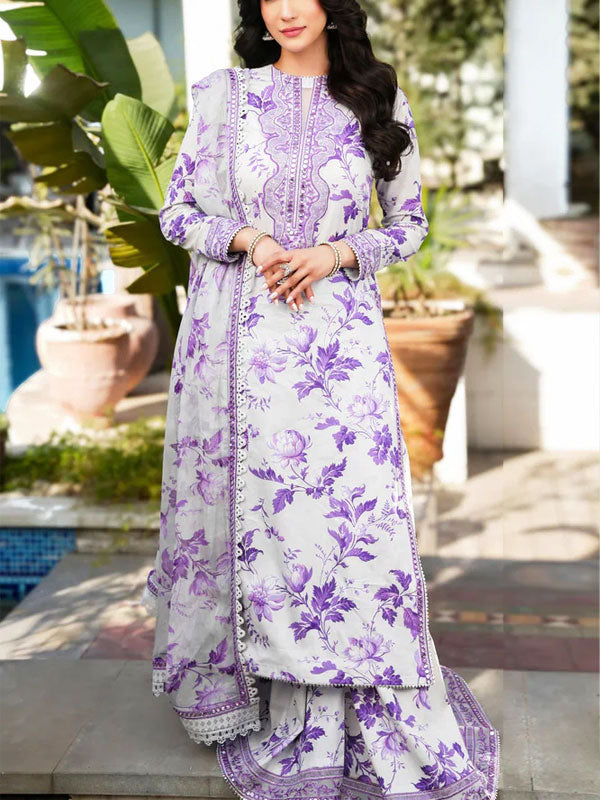 Woman wearing a purple and white floral traditional outfit outdoors.